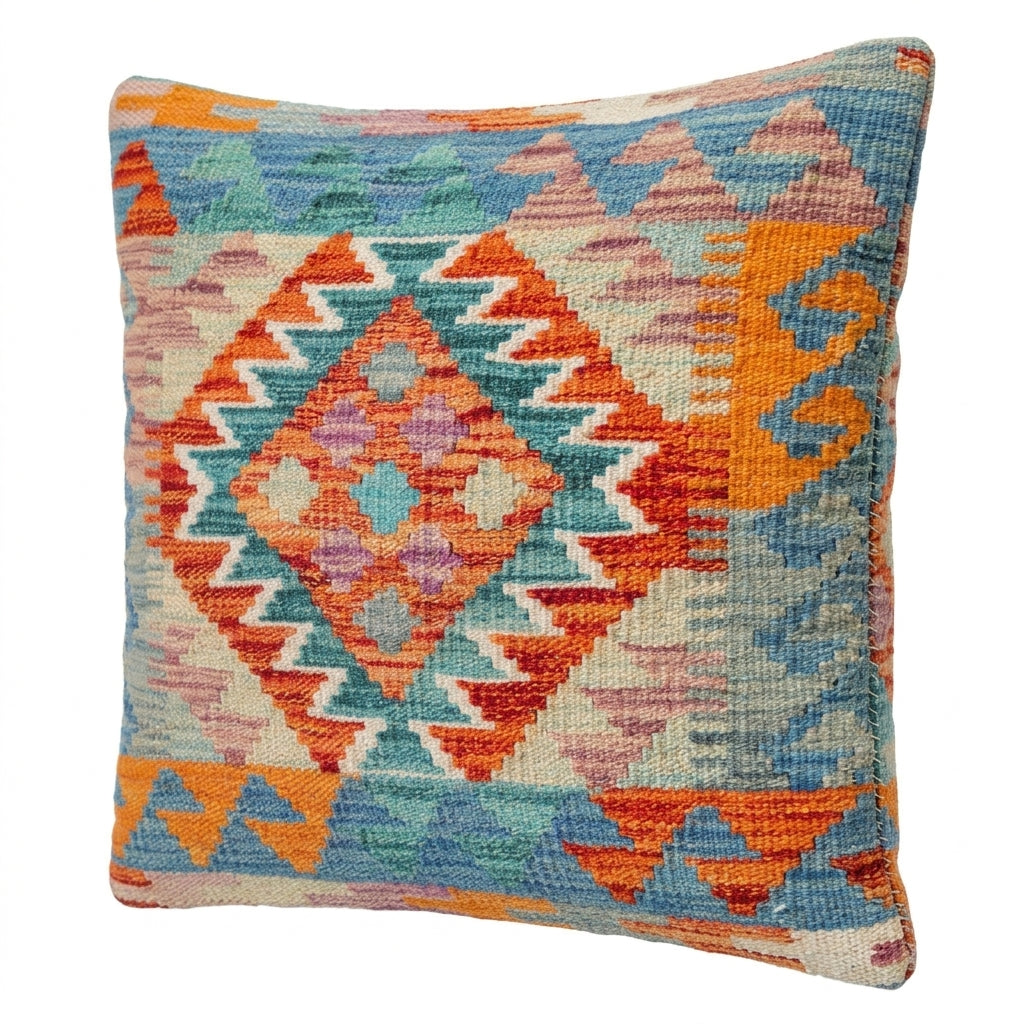 Colorful Kilim cushion from eastofhere with intricate geometric patterns, perfect for adding bohemian style to your space.