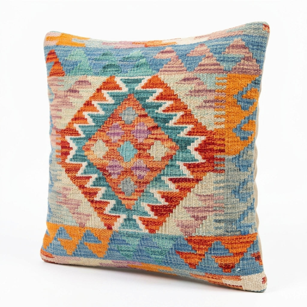 Colorful kilim cushion by eastofhere featuring traditional woven patterns and vibrant geometric designs.