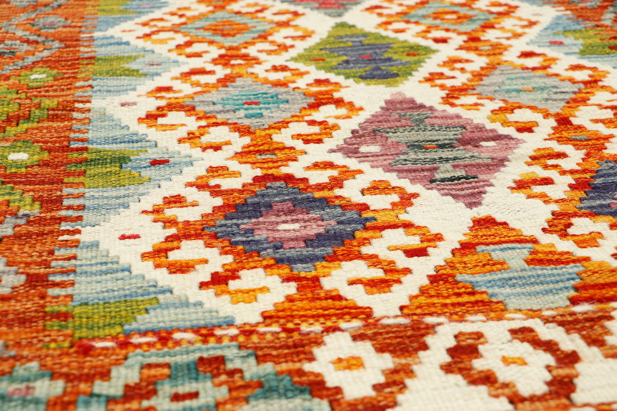 Afghan Kilim runner rug by eastofhere with geometric patterns, measuring 146 x 62cm, showcasing vibrant colors and traditional craftsmanship.