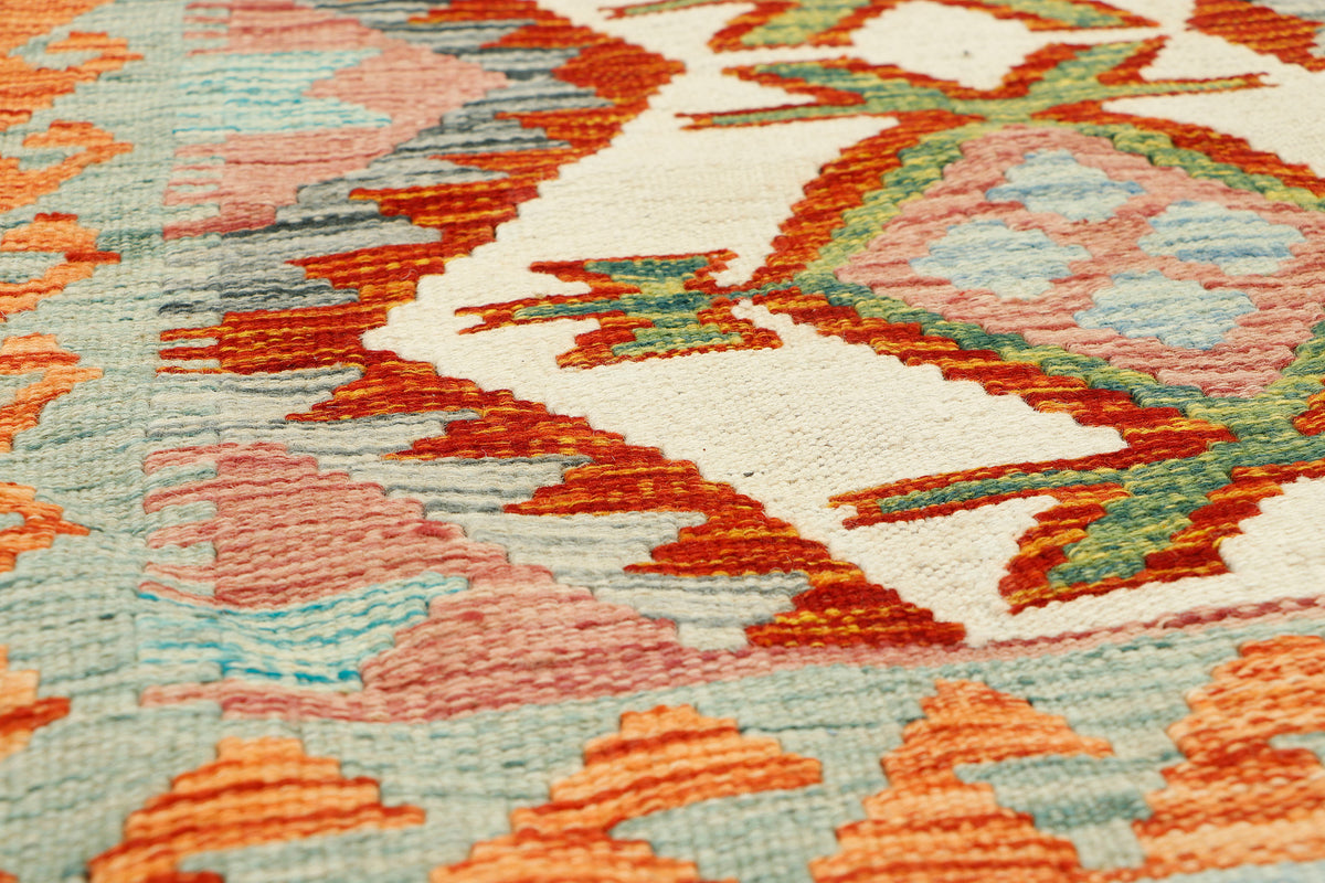 Afghan Kilim rug runner by eastofhere, 164x66cm, featuring traditional geometric patterns in vibrant colors.