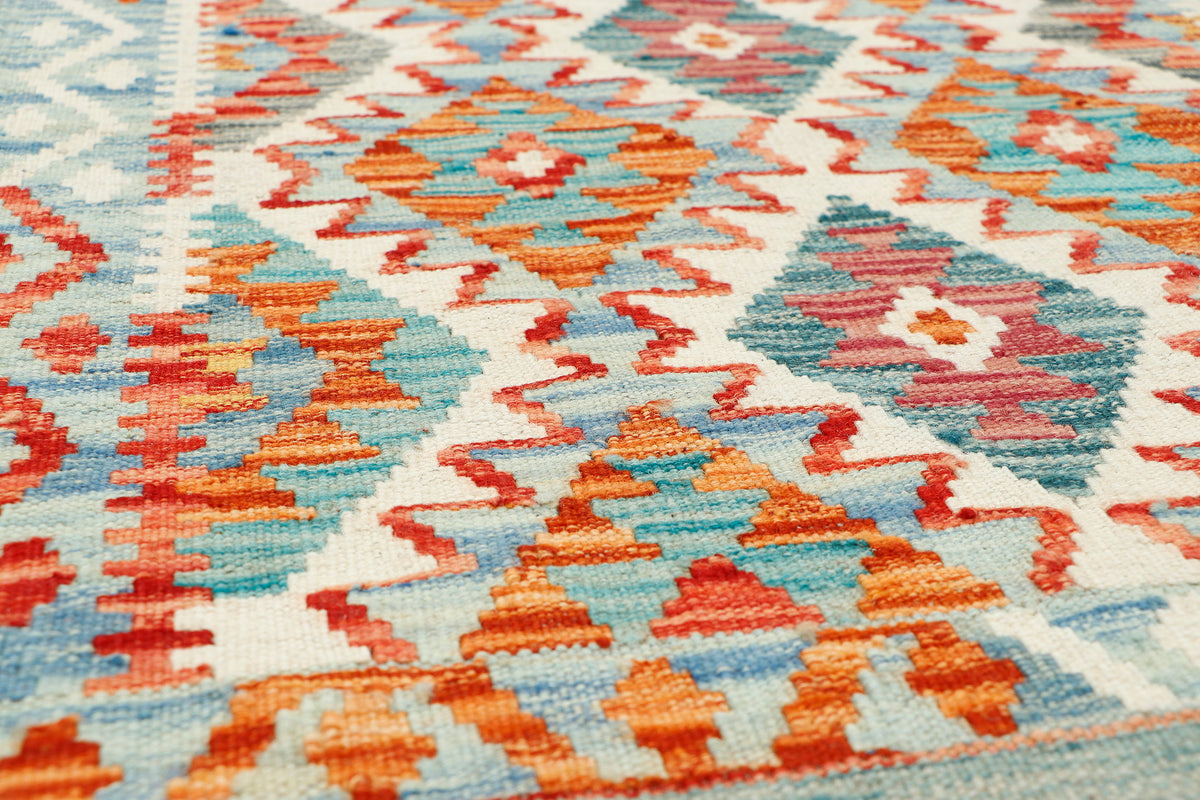 Afghan Kilim Runner rug by eastofhere, 158x68cm, featuring traditional woven geometric patterns in vibrant colors.
