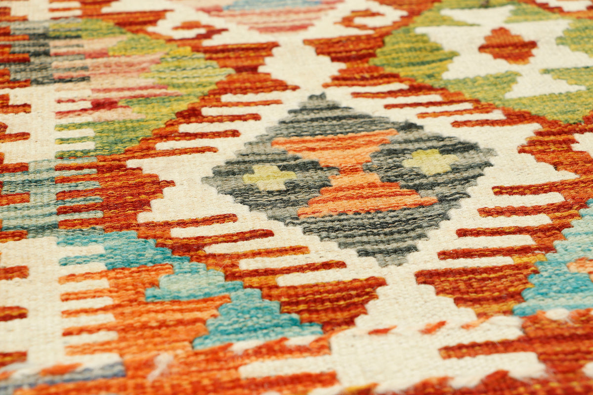 Afghan Kilim runner rug by eastofhere, 145x57cm, vibrant geometric patterns, woven textile with traditional craftsmanship.