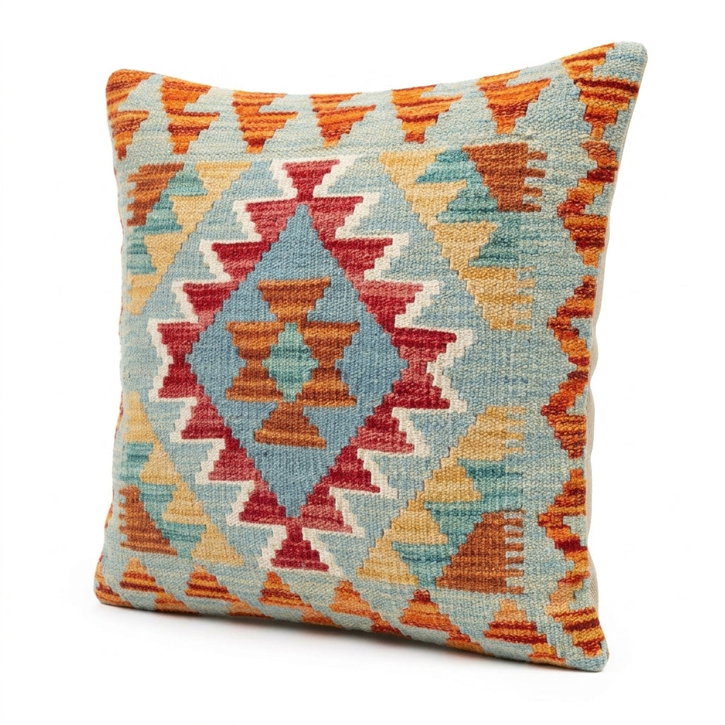 Colorful kilim cushion by eastofhere featuring traditional woven patterns and vibrant geometric designs.