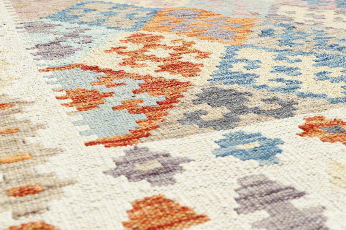 Afghan Kilim rug by eastofhere, 200x154cm, featuring colorful geometric patterns and traditional woven textile design.