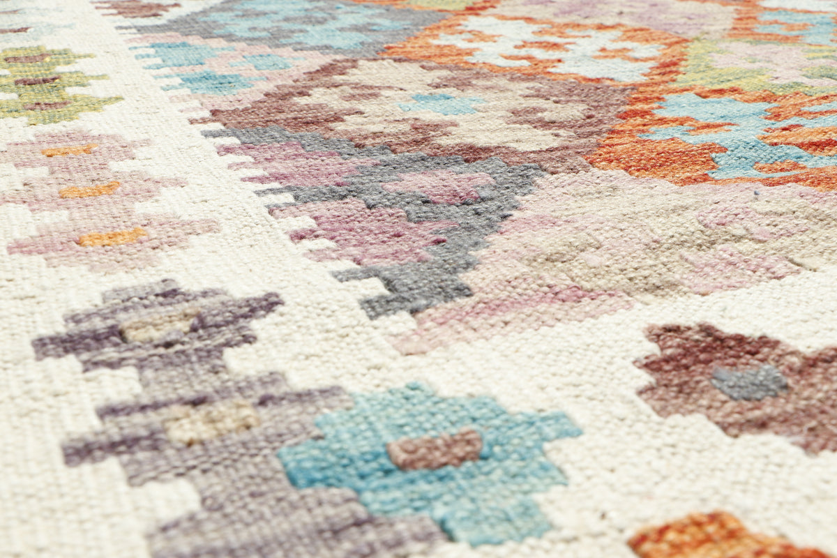 Afghan Kilim rug by eastofhere, 199x155cm, featuring traditional geometric patterns and vibrant colors on woven fabric.