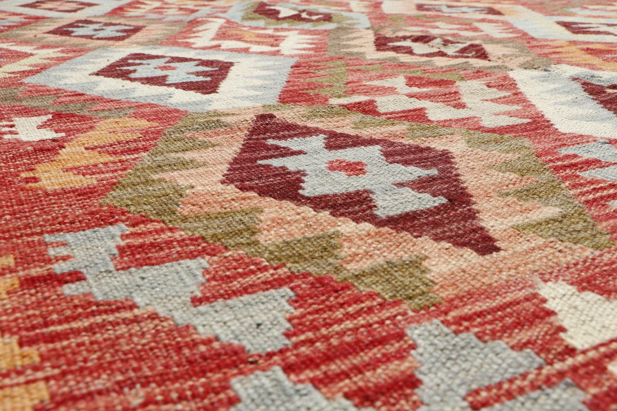 Afghan Kilim rug by eastofhere, 208x157cm, featuring traditional geometric patterns and vibrant colors on a woven textile.