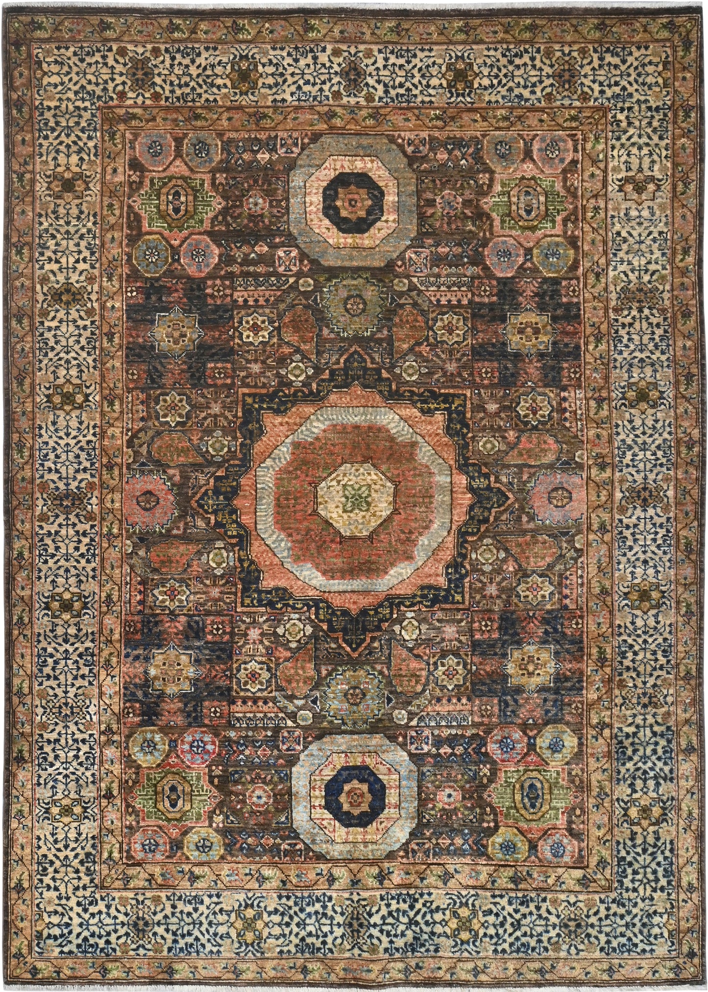Decorative rug with intricate patterns and colors on a dark background