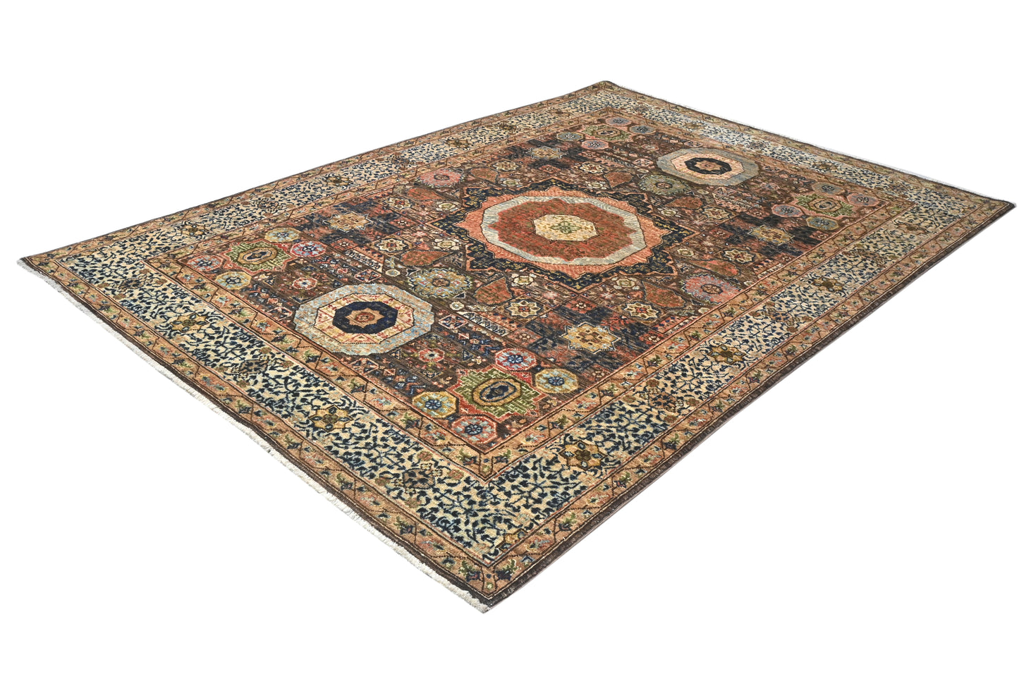 Decorative rug with intricate patterns on a white background