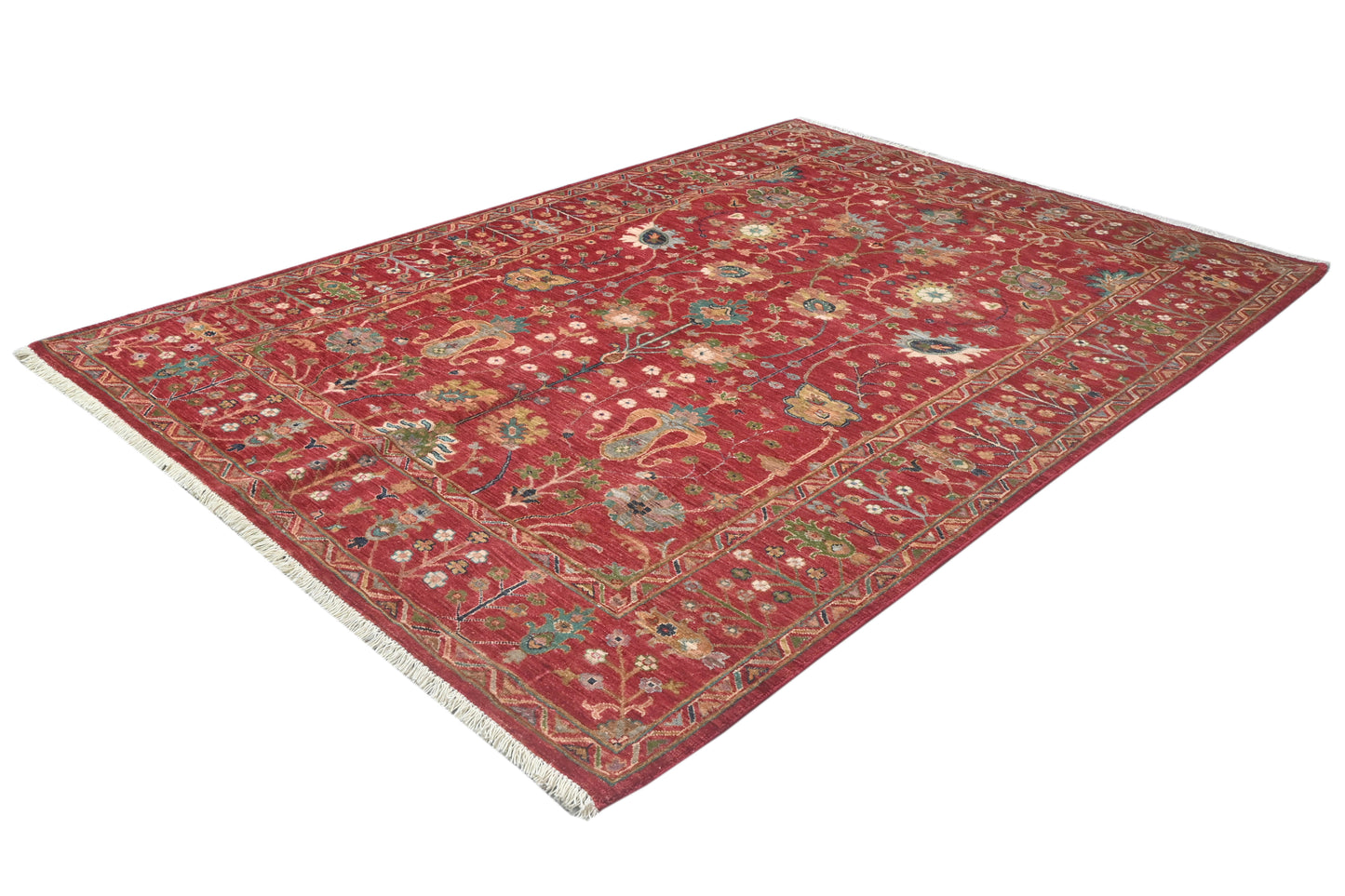 Red patterned rug on a white background