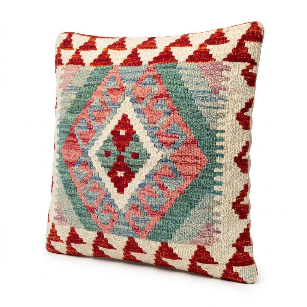 Colorful kilim cushion by eastofhere featuring traditional woven geometric patterns and vibrant textile details.