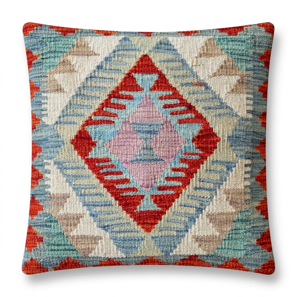 Kilim cushion with geometric pattern in red, blue, beige, and pink, square shape, decorative textile from eastofhere brand.