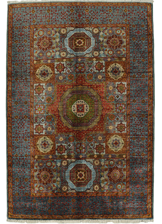 Fine Afghan Mamluk rug with intricate patterns, measuring 185x127cm, showcasing traditional craftsmanship and rich colors.