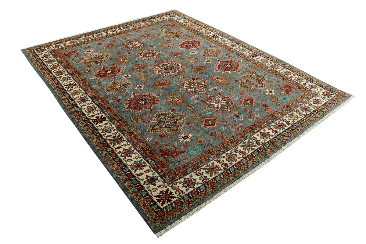 Large Afghan Kazak rug by eastofhere featuring intricate geometric patterns in rich earthy tones, measuring 303x247cm.