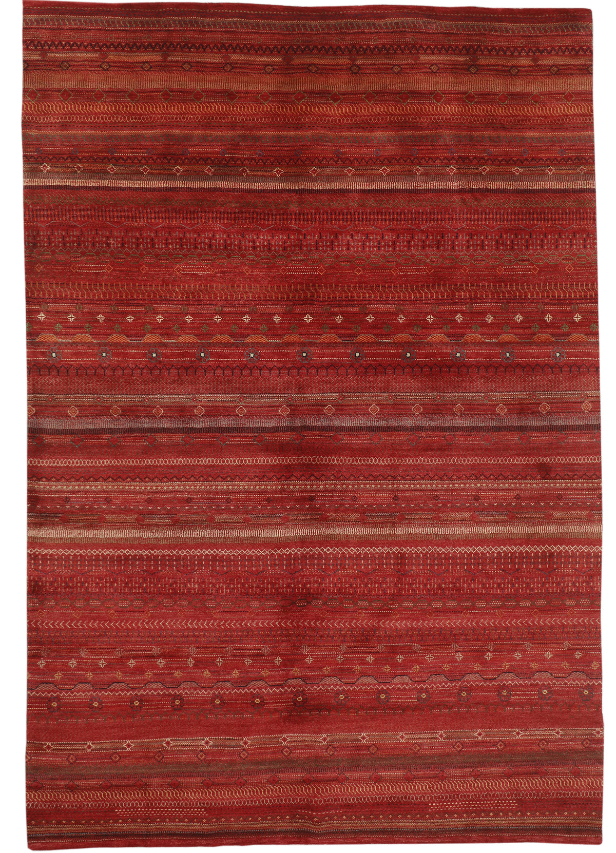 Afghan Gabbeh rug by eastofhere featuring geometric patterns in warm earthy shades, measuring 299 x 206cm, handcrafted textile.