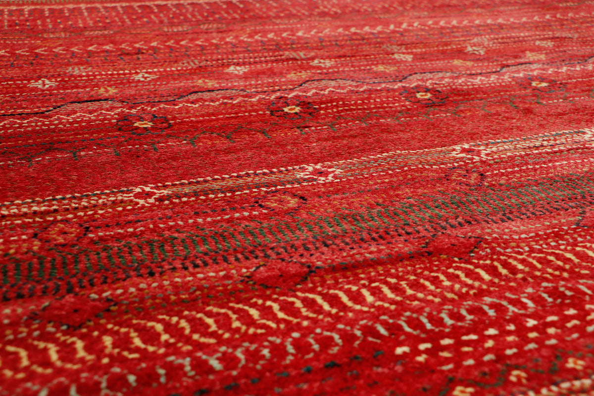Afghan Gabbeh rug by eastofhere, 299 x 206cm, featuring traditional handwoven design with vibrant geometric patterns.