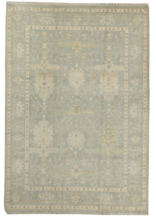 Afghan Oushak rug with intricate patterns, measuring 265x185cm, featuring traditional design and warm earthy tones.