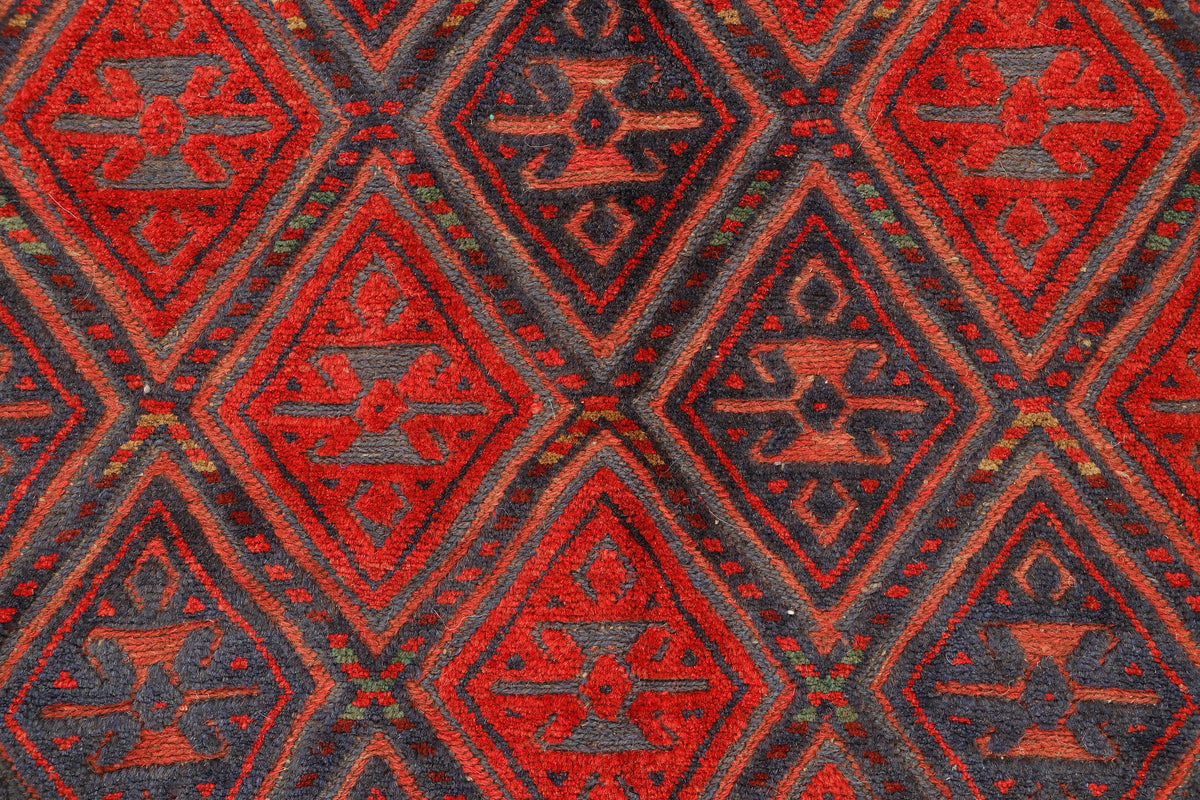 Afghan Meshwani rug by eastofhere showing intricate geometric patterns in warm earthy tones, measuring 183x147cm.