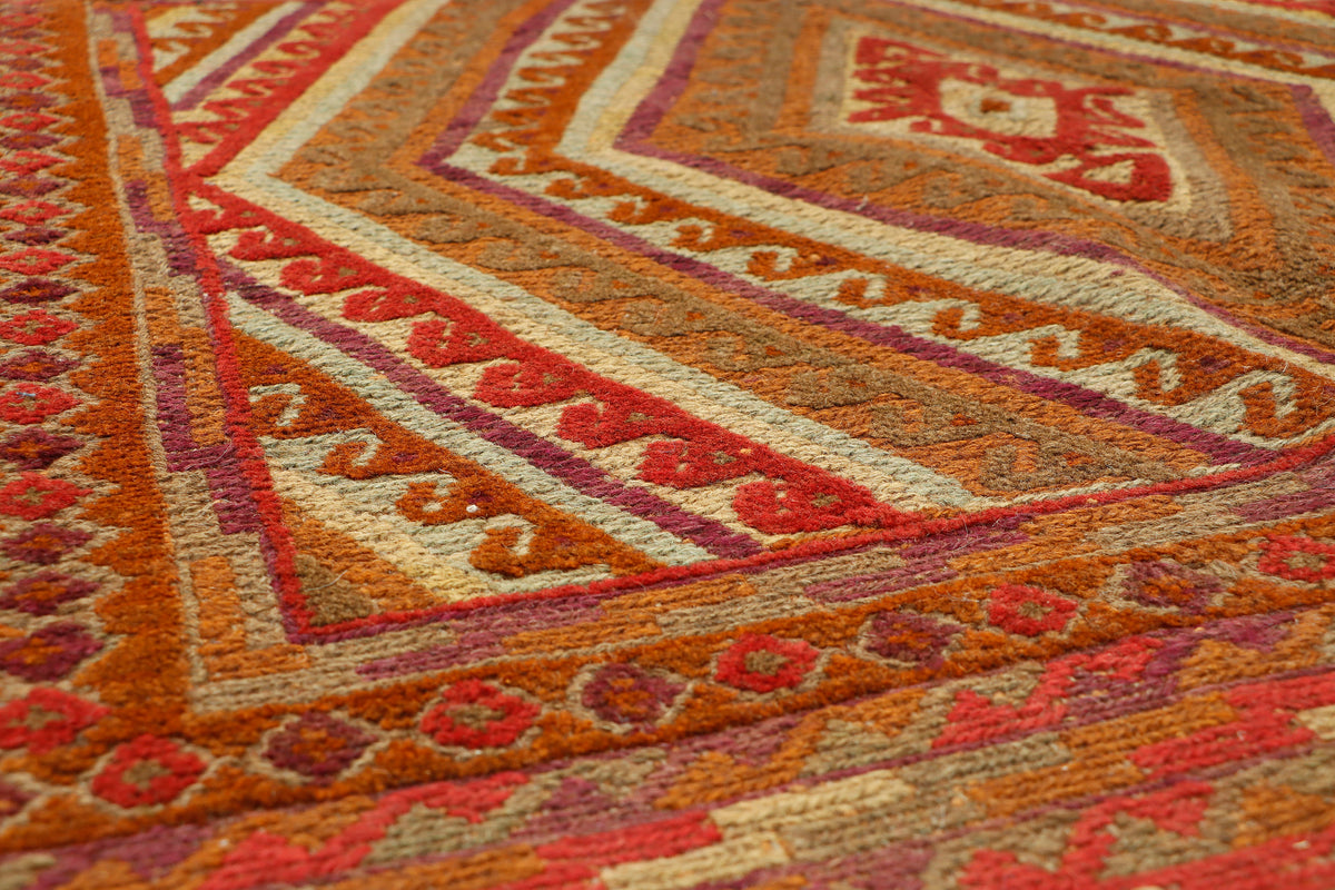 Afghan Meshwani rug by eastofhere, 119x118cm, featuring traditional woven patterns in earthy tones.