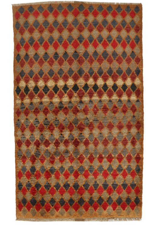 Afghan Balouchi rug with intricate patterns in earthy tones, measuring 189x113cm, from eastofhere with detailed woven design.