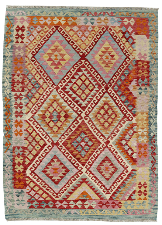 Afghan Kilim rug by eastofhere, 207x150cm, featuring geometric patterns and vibrant colors, displayed on a wooden floor.