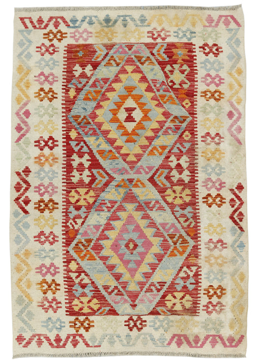 Afghan Kilim rug by eastofhere featuring vibrant geometric patterns, measuring 148x103cm, traditional woven textile for home decor
