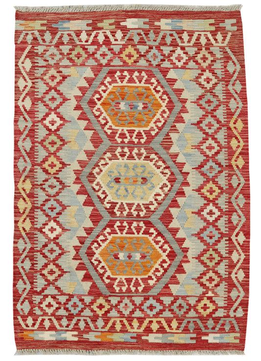 Afghan Kilim rug by eastofhere, 150x105cm, featuring traditional geometric patterns in vibrant colors on woven textile.
