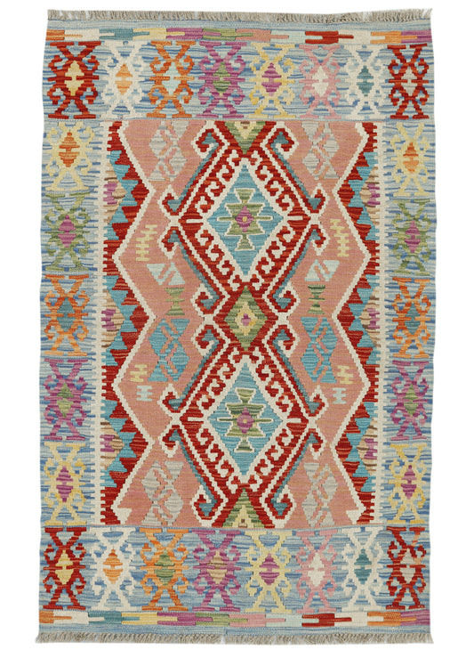Afghan Kilim rug by eastofhere, 152x96cm, featuring traditional geometric patterns and vibrant colors on woven textile.