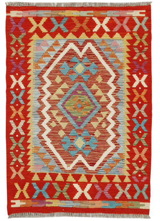 Afghan Kilim rug by eastofhere with geometric patterns, measuring 117x79cm, showcasing vibrant colors and traditional woven design.