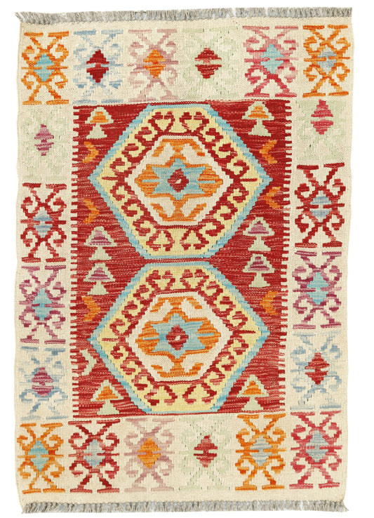 Afghan Kilim rug by eastofhere, 113x79cm, featuring traditional geometric patterns and vibrant colors on woven textile.