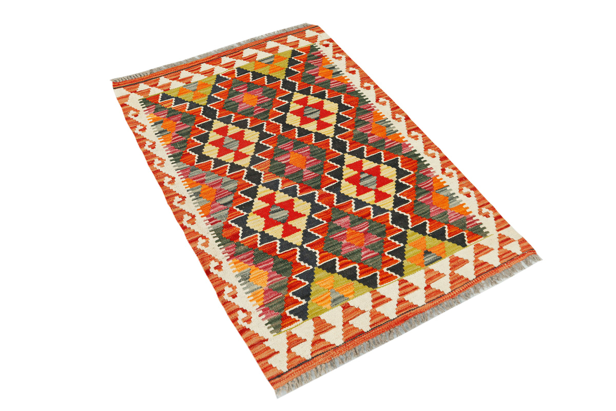 Afghan Kilim rug by eastofhere, 120x80cm, featuring traditional geometric patterns in vibrant colors.