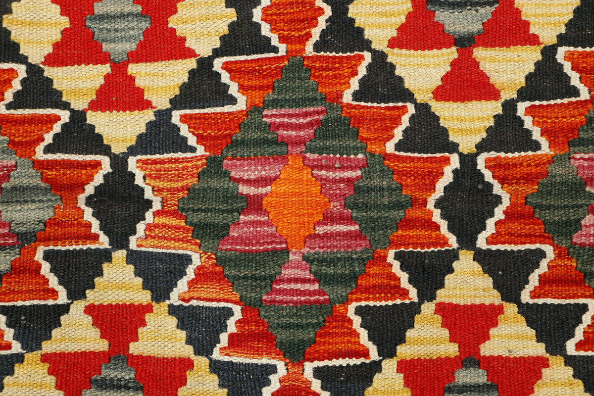 Afghan Kilim rug by eastofhere with intricate geometric patterns in vibrant colors, measuring 120x80cm, traditional woven design.