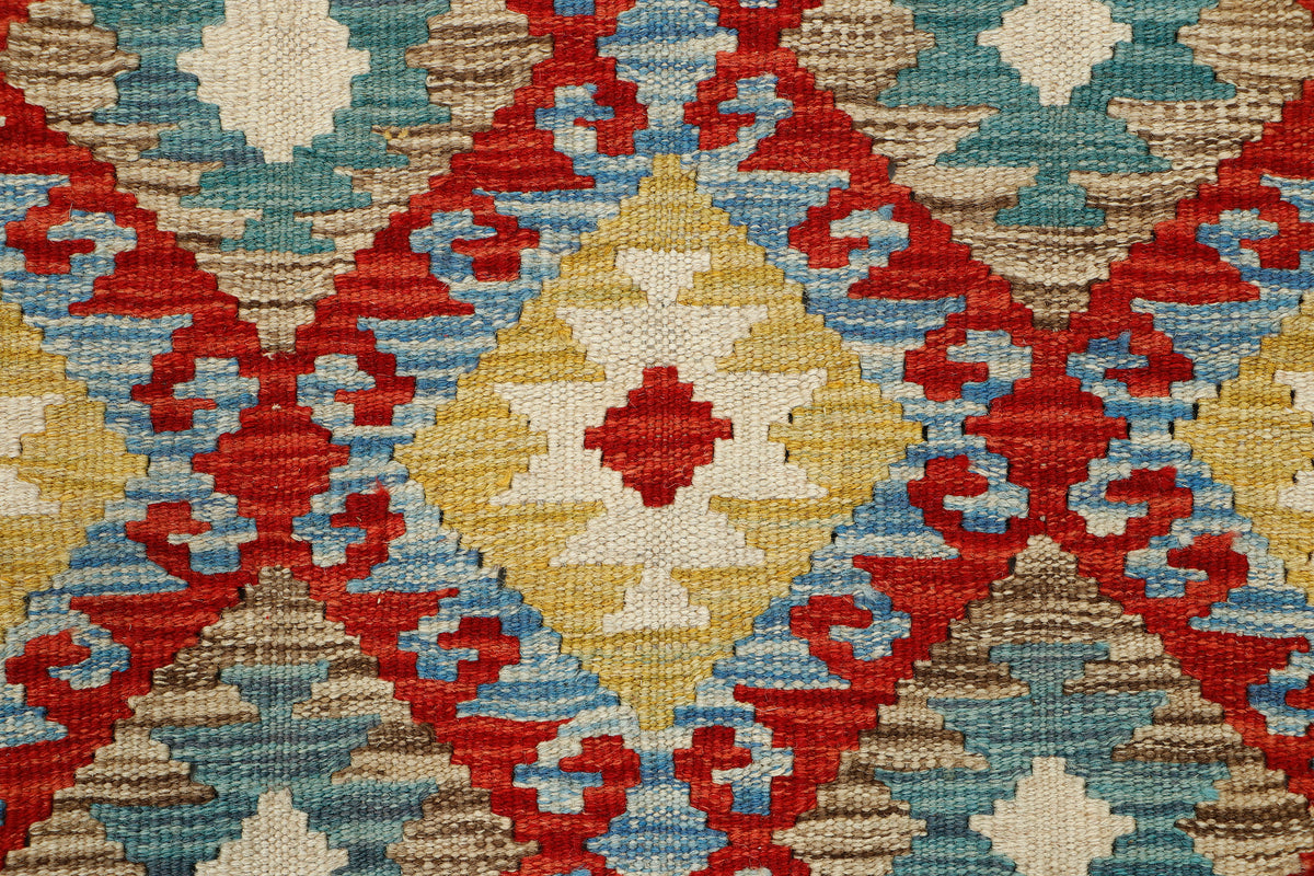 Afghan Kilim rug with geometric patterns in earthy tones, measuring 117 x 80cm, from Eastofhere.