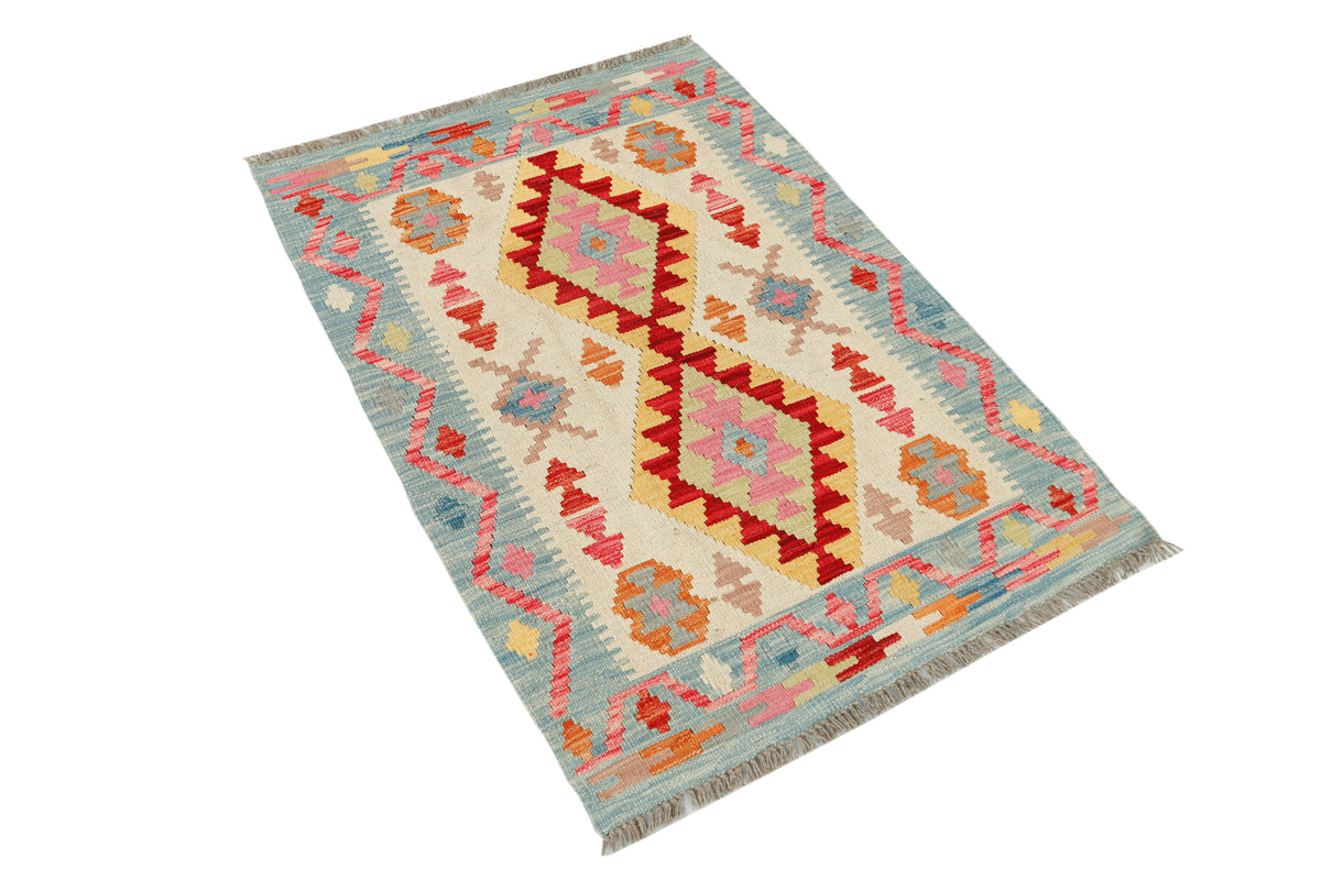 Afghan Kilim rug by eastofhere featuring traditional geometric patterns in vibrant colors, measuring 117x78cm.