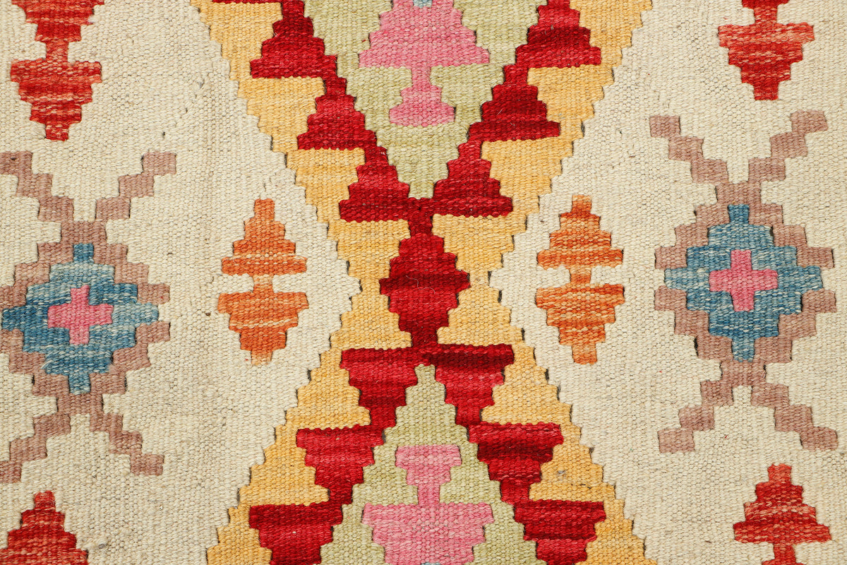 Afghan Kilim rug by eastofhere, 117x78cm, featuring traditional geometric patterns and vibrant colors, woven textile decor.