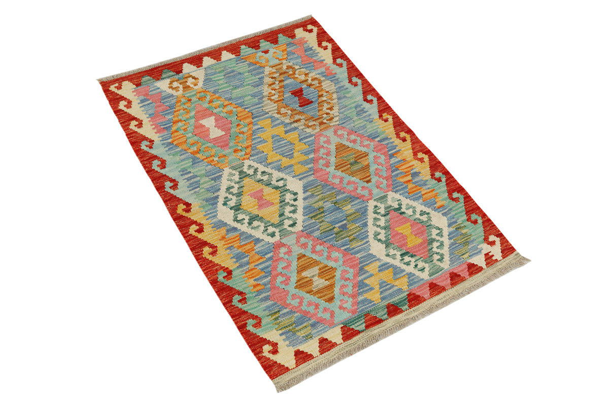 Afghan Kilim rug by eastofhere featuring intricate geometric patterns in vibrant colors, measuring 115x78cm.