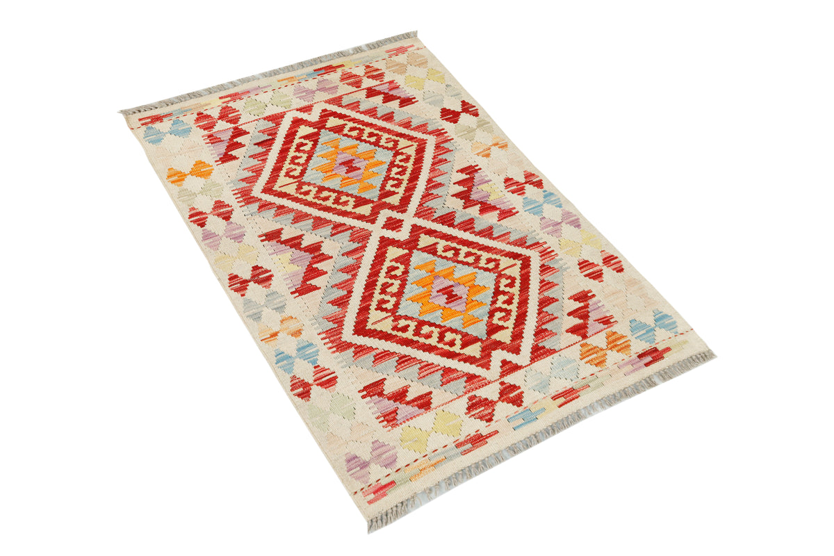 Afghan Kilim rug by eastofhere featuring traditional geometric patterns and vibrant colors, measuring 111x75cm.