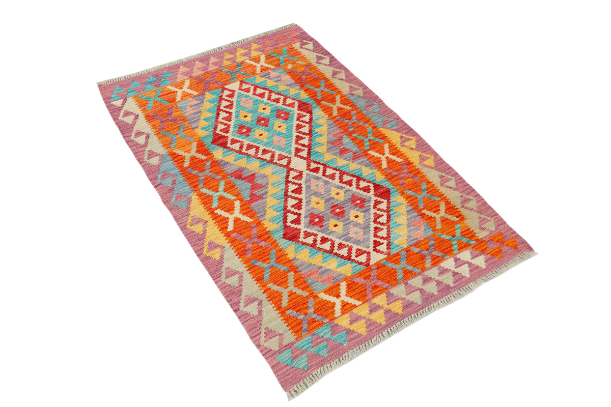Afghan Kilim rug by eastofhere with vibrant geometric patterns, 123x82cm, showcasing traditional woven textile design.