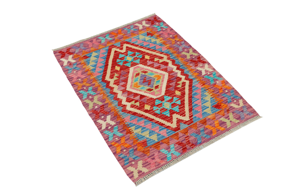 Afghan Kilim rug by eastofhere with geometric patterns in earthy tones, measuring 106x84cm, showcasing traditional woven design.