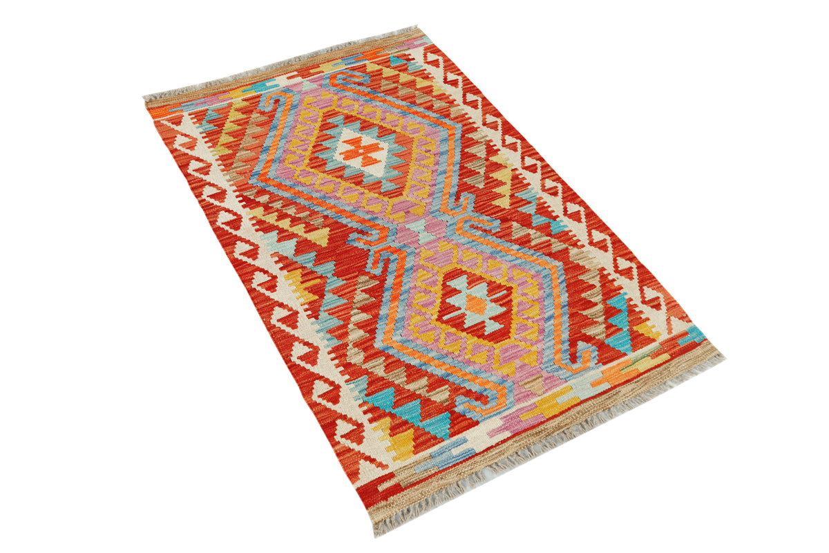 Afghan Kilim rug by eastofhere, 124x77cm, featuring traditional geometric patterns and vibrant colors displayed on a flat surface.