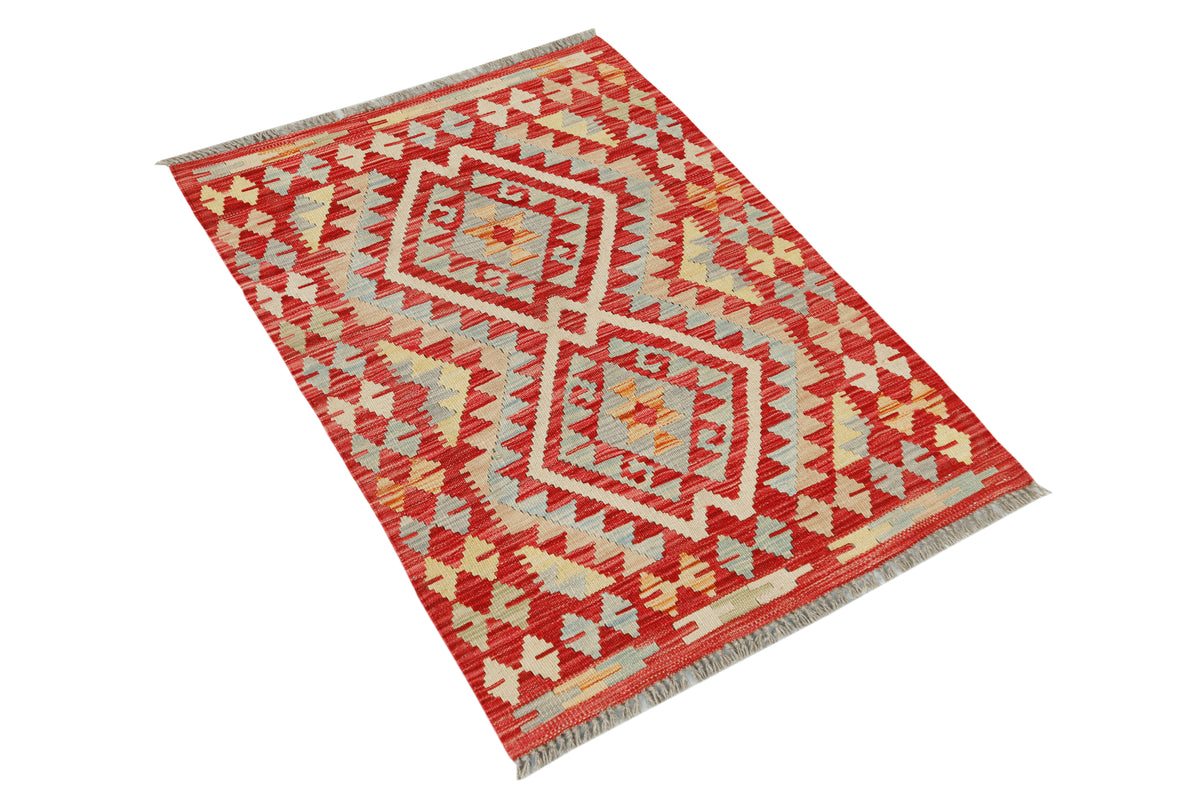 Afghan Kilim rug with geometric patterns, 109x77cm, handmade wool textile from Eastofhere displayed on a neutral background.