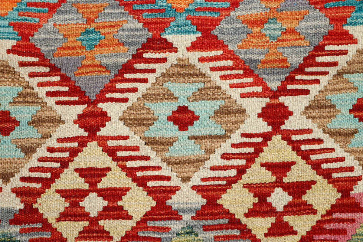 Afghan Kilim rug by eastofhere, 126x80cm, featuring traditional geometric patterns and vibrant colors, woven textile for home decor.