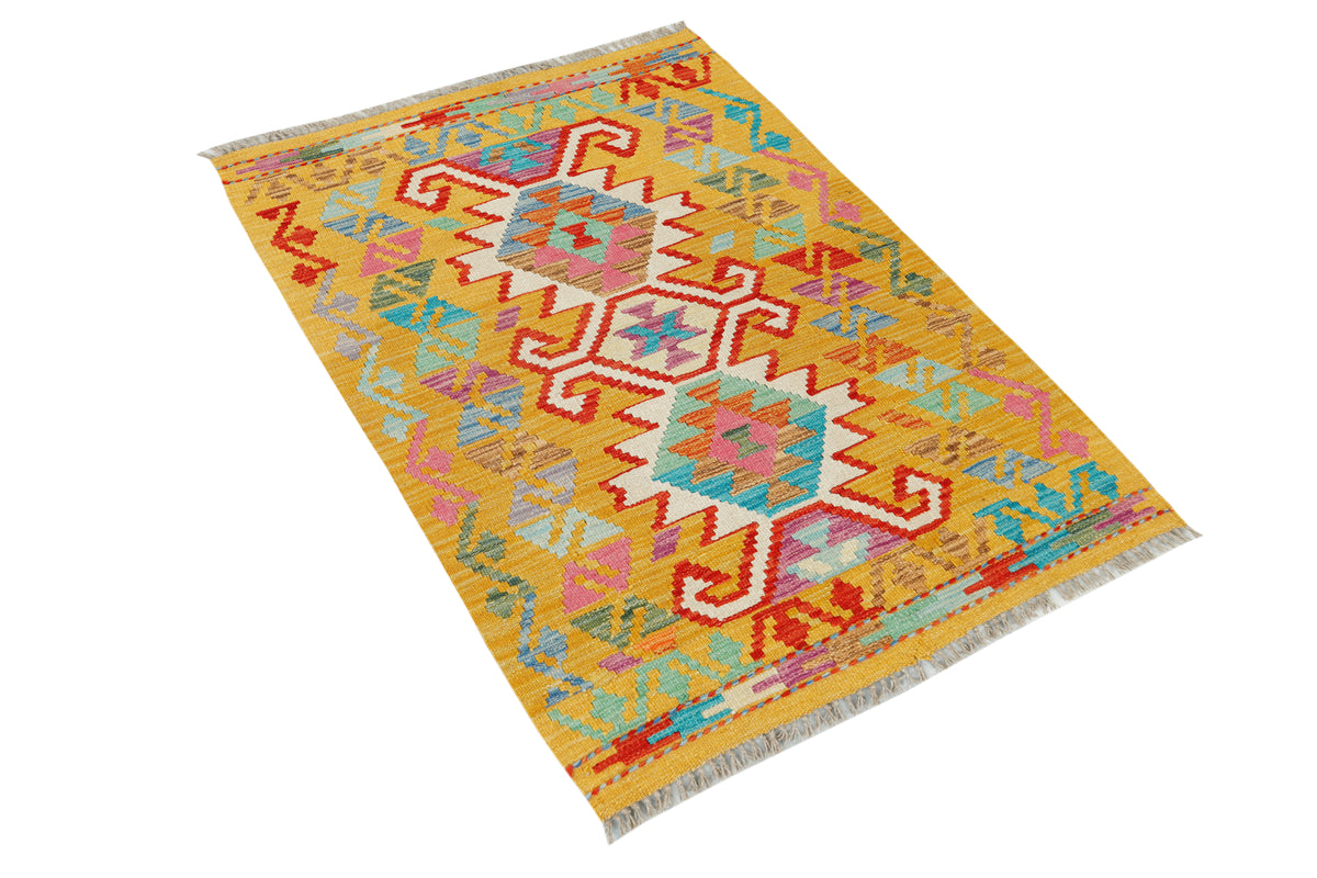 Afghan Kilim rug by eastofhere, 125x88cm, featuring traditional geometric patterns in vibrant colors on a flatwoven textile.