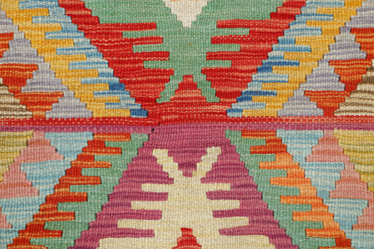 Afghan Kilim rug by eastofhere featuring intricate geometric patterns, 118x85cm, woven textile for traditional home decor.