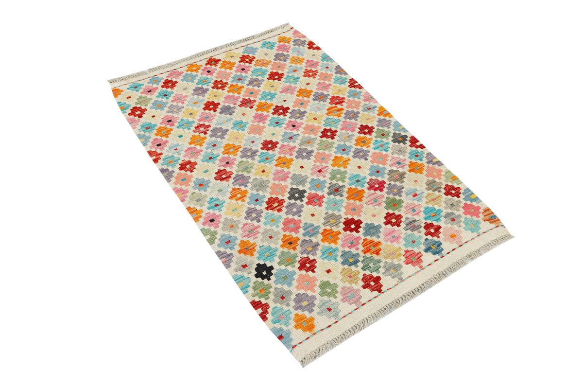 Afghan Kilim rug by eastofhere, 118x75cm, woven textile with vibrant geometric patterns and traditional craftsmanship.