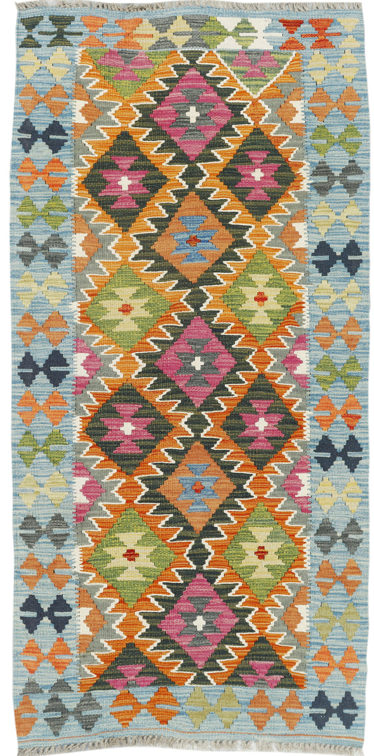 Afghan Kilim runner rug by eastofhere, 175x84cm, featuring traditional geometric patterns and vibrant colors on a woven fabric.