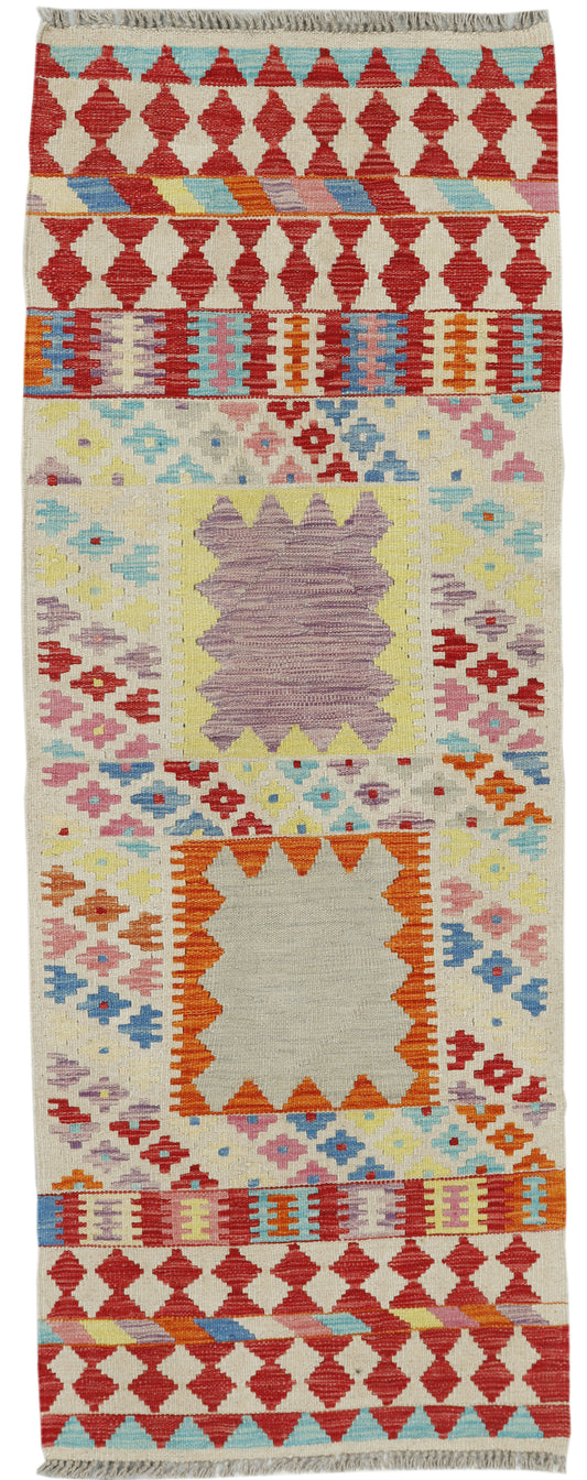 Afghan Kilim runner rug by eastofhere, 184x68cm, featuring traditional geometric patterns and vibrant colors on woven fabric.