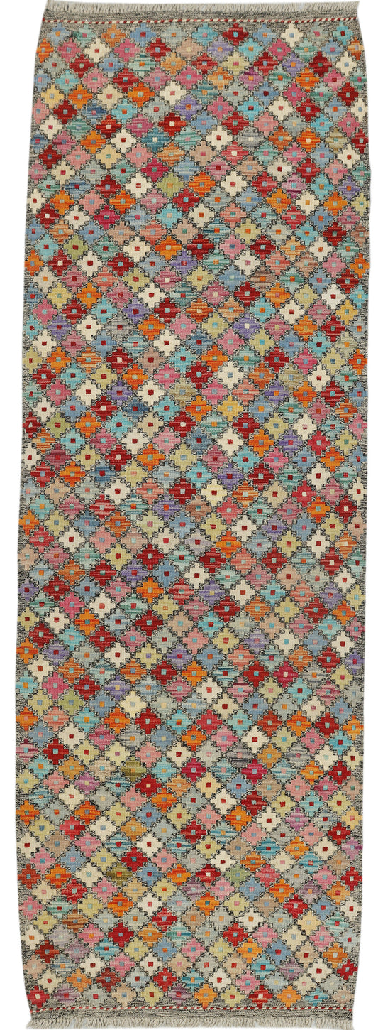Afghan Kilim runner rug by EastOfHere, 240x80cm, featuring traditional geometric patterns in vibrant colors.