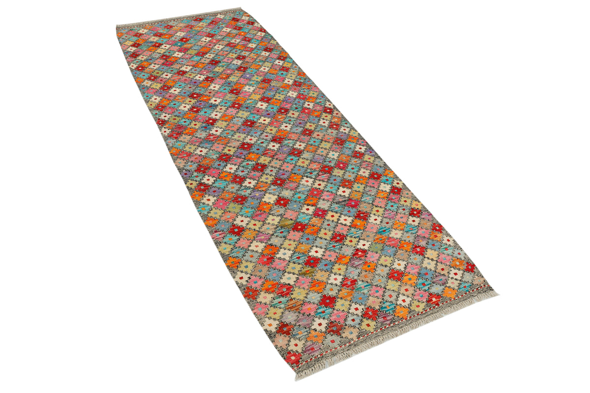 Afghan Kilim runner rug by eastofhere, 240cm x 80cm, featuring traditional geometric patterns and vibrant colors.