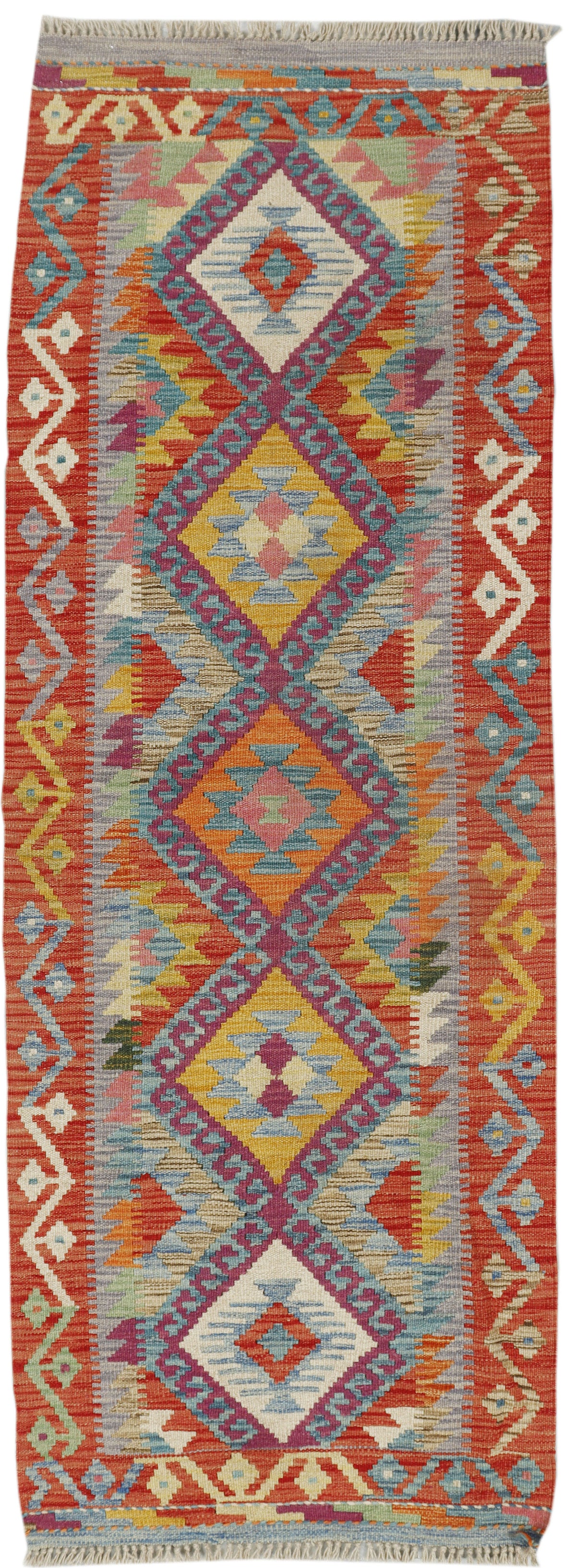 A flatweave geometric kilim rug with a vibrant multicolor pattern featuring red, orange, yellow, blue, and beige diamond motifs.