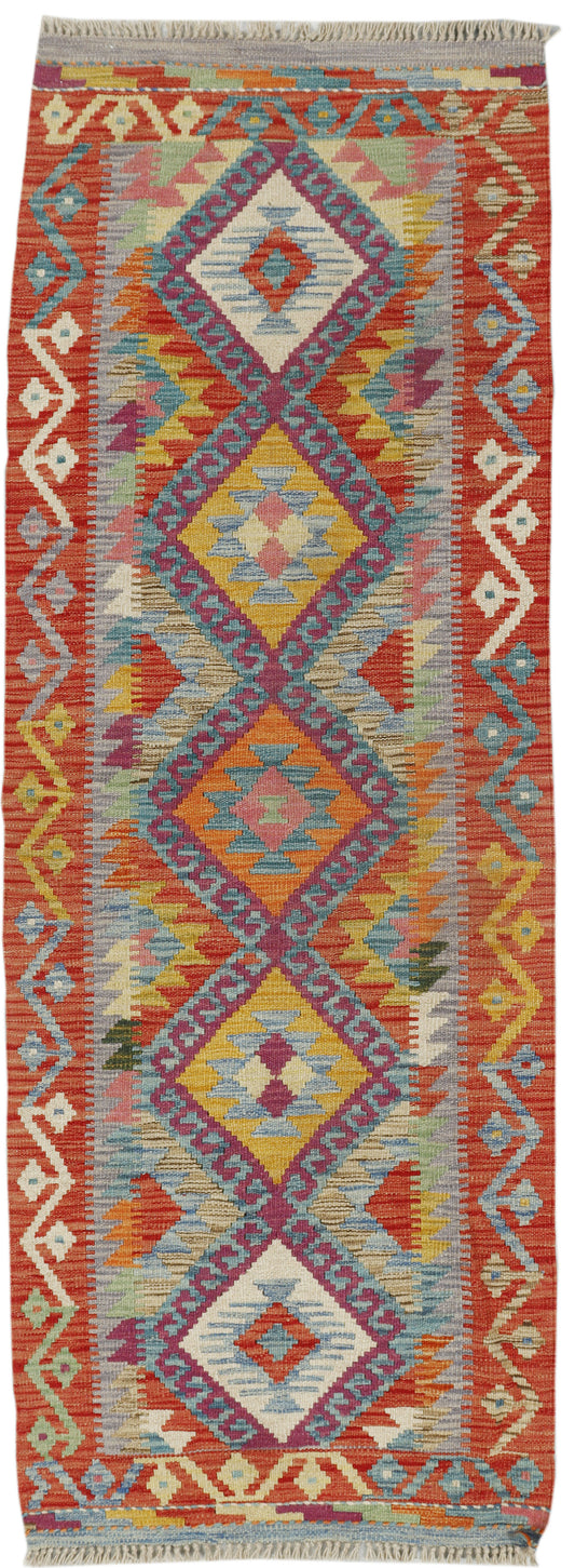 Afghan Kilim runner rug by eastofhere, 195 x 66cm, featuring traditional geometric patterns and vibrant colors.